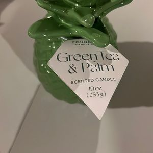 Brand new green tea and palm scented candle.